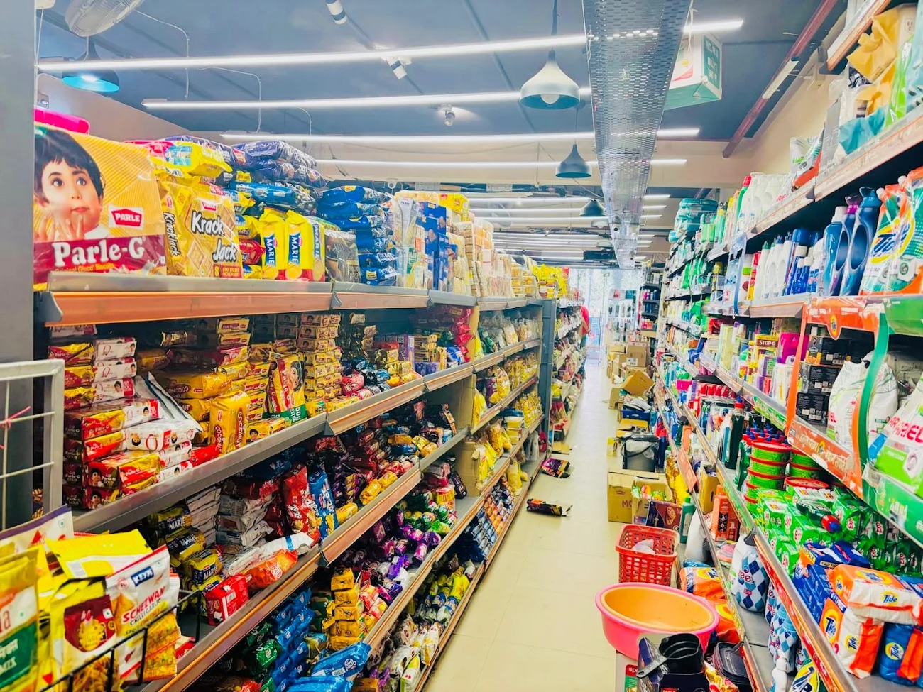 Well-stocked grocery aisles at the Arihant Arden store